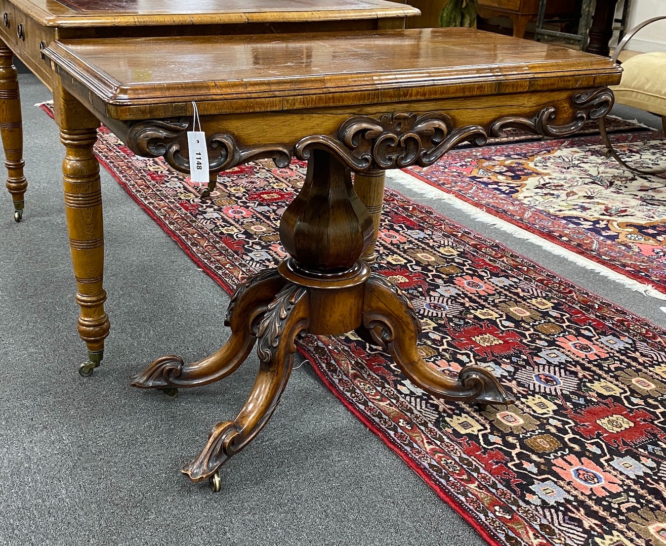 An early Victorian rectangular rosewood folding card table width 92cm, depth 45cm, height 73cm